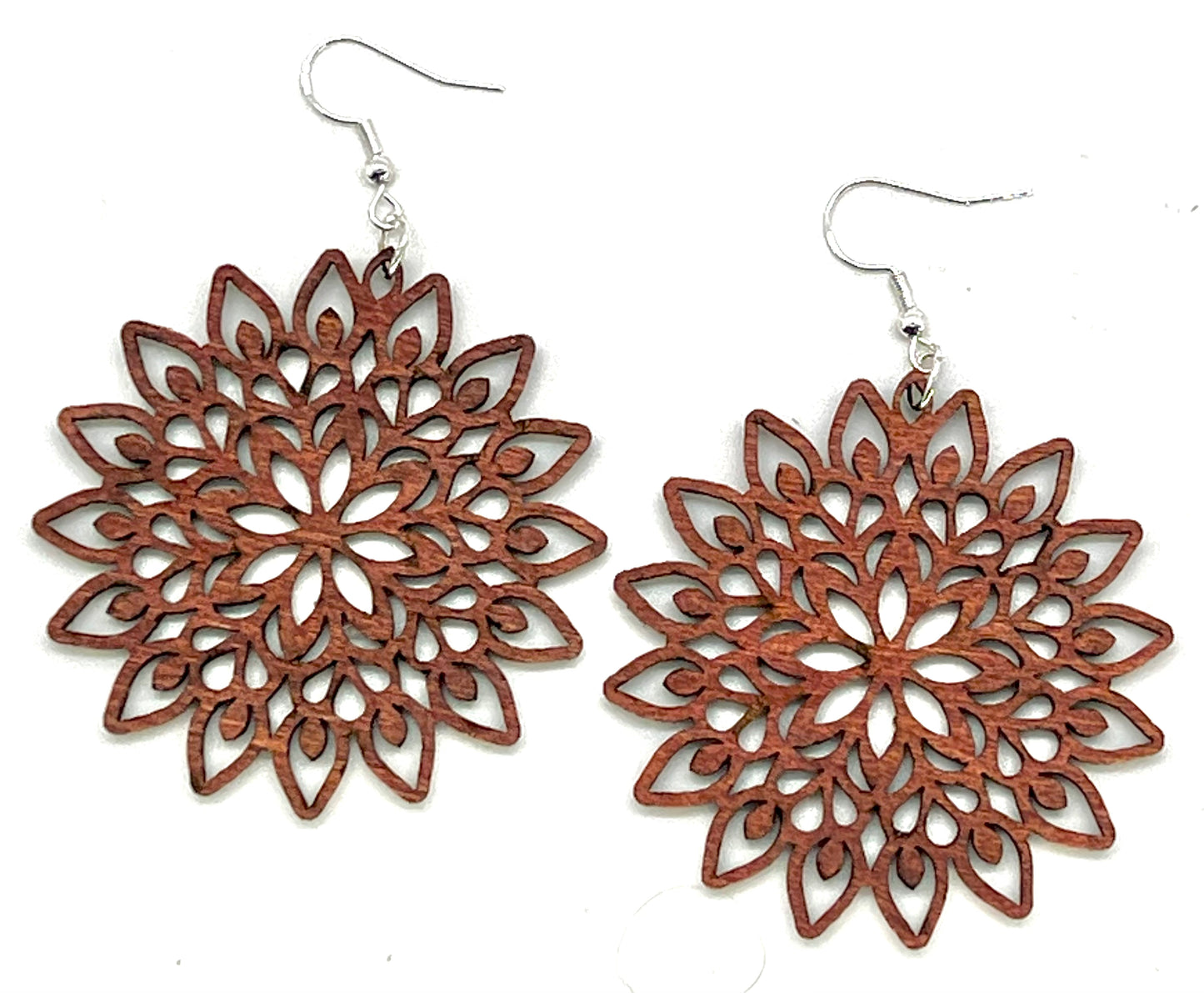 Detailed laser wood circular cut earrings